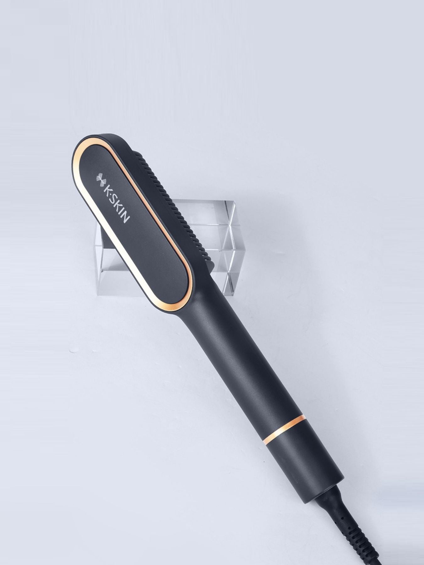 Black Trendsi fast heating straightening comb with North American plug, designed for quick, effortless hair styling.