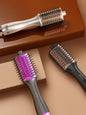 Black Trendsi multifunctional hot air brush with North American plug, showing the brush head and handle in a close-up shot.