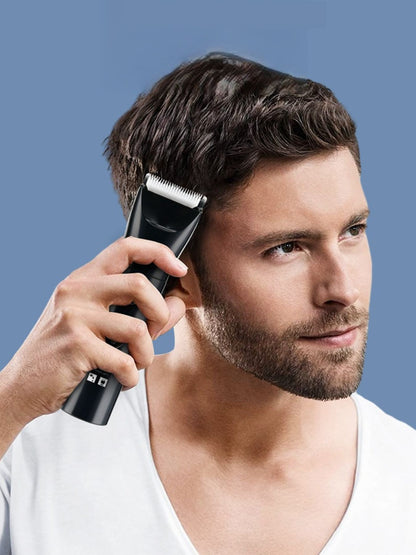 Black Trendsi cordless rechargeable hair clipper with adjustable blades, showing its ergonomic design and charging port.