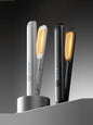 Black cordless rechargeable hair straightener by Trendsi, compact and sleek with ceramic plates for smooth styling.