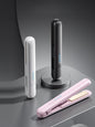 Black cordless rechargeable hair straightener from Trendsi with a sleek, ergonomic design for easy styling on the go.