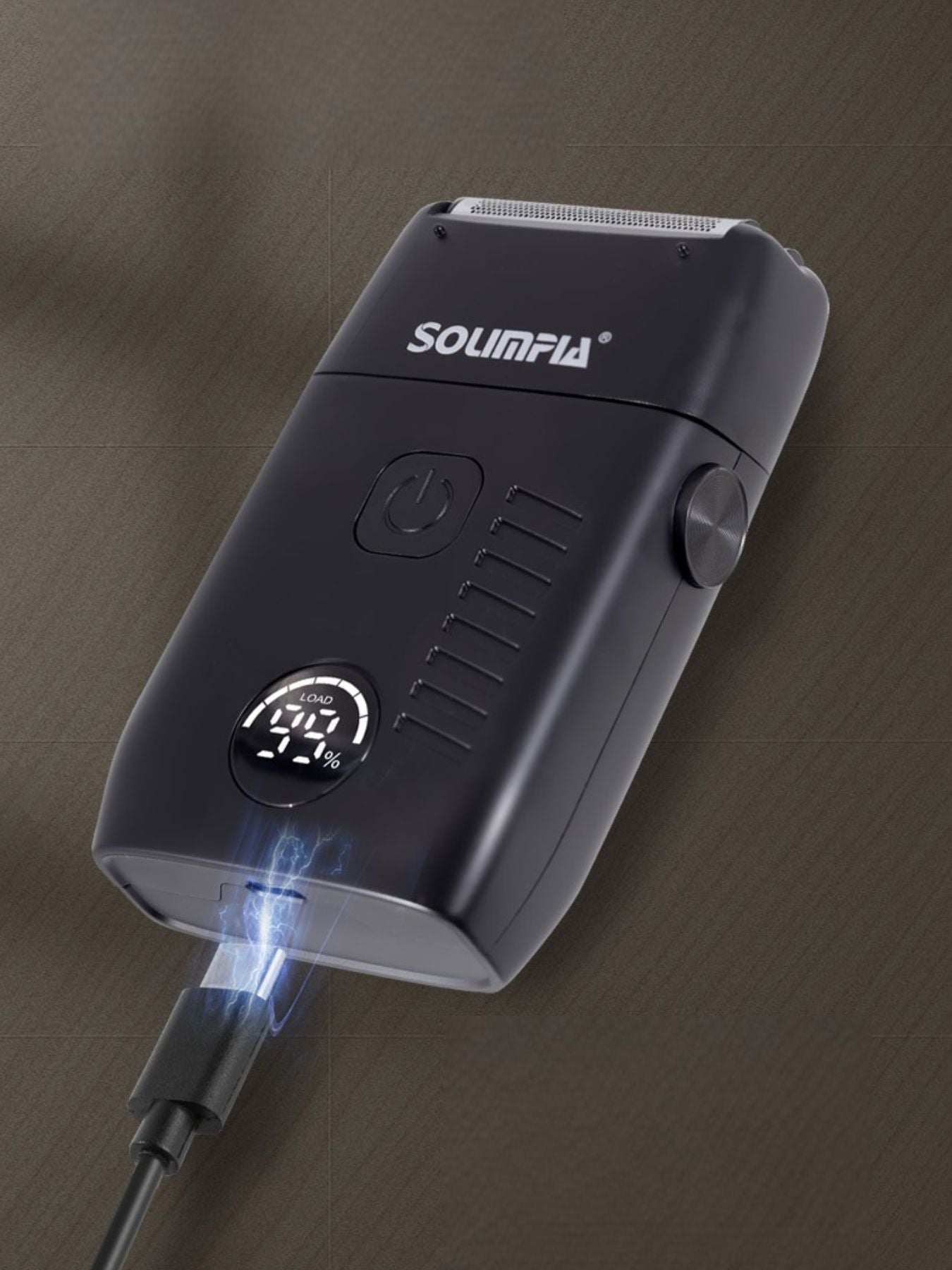 Black portable electric shaver from Trendsi with a sleek design, compact for easy travel grooming.