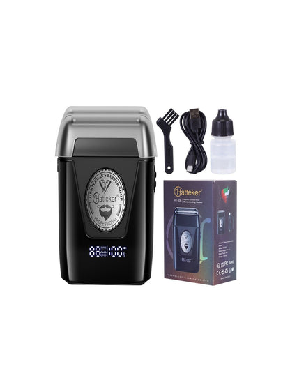 Black portable electric shaver by Trendsi, compact design with precision blades for quick grooming.