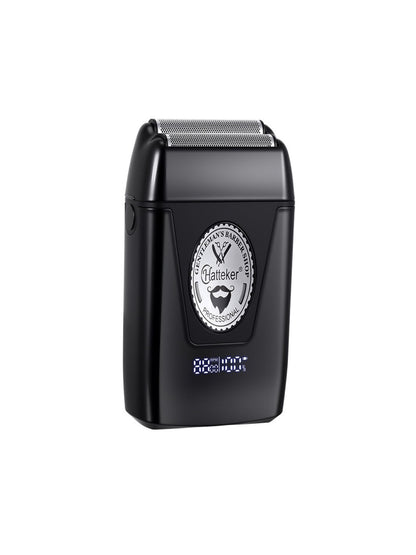 Black portable electric shaver by Trendsi, compact design with a sleek appearance, suitable for grooming on the go.