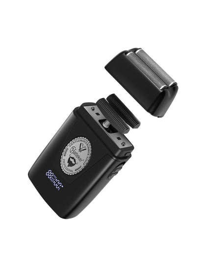 Black Trendsi portable electric shaver with ergonomic design and one-size fits all for convenient grooming.