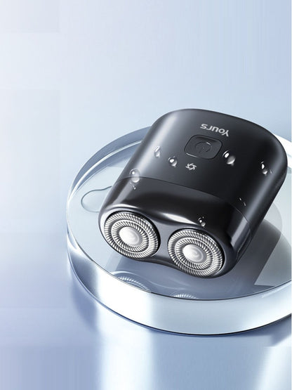 Black portable mini electric shaver by Trendsi, compact design suitable for on-the-go grooming and close shaving.