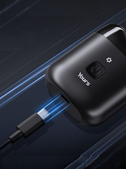 Black portable mini electric shaver by Trendsi, compact design ideal for travel and quick grooming.
