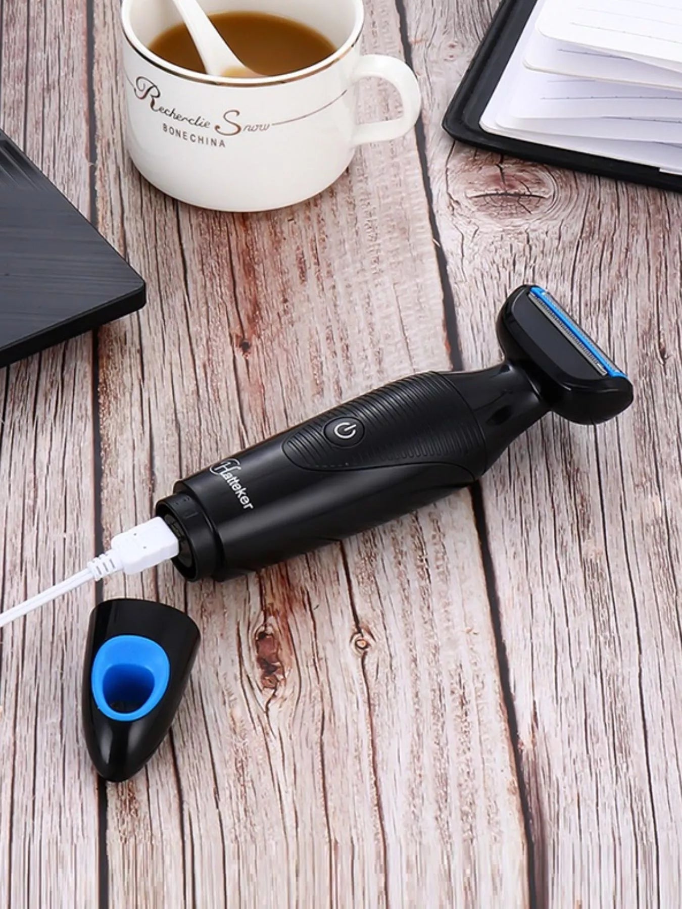 Black rechargeable electric hair removal epilator by Trendsi with sleek design for efficient at-home hair removal.