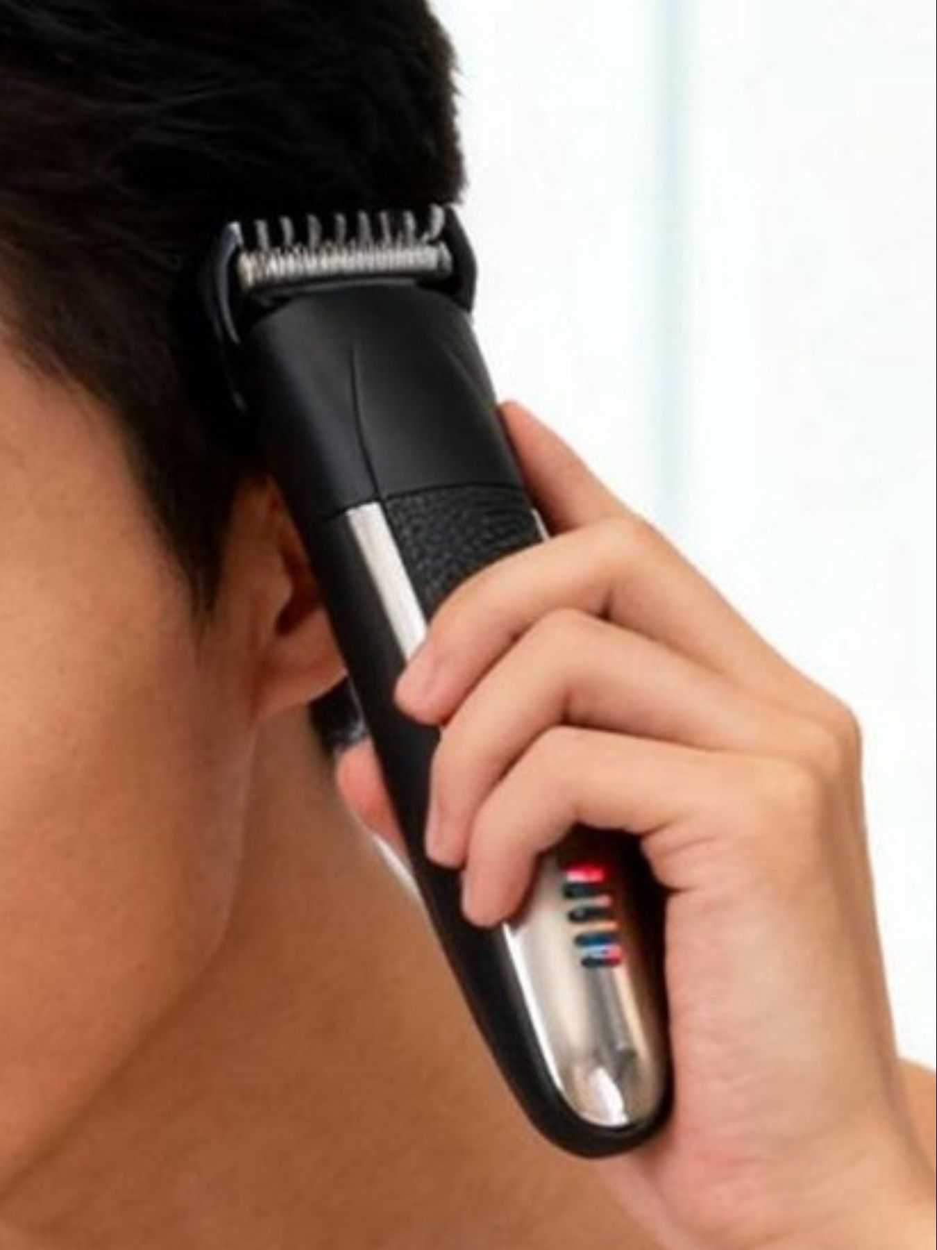 Black Trendsi 3-in-1 multifunctional electric shaver with interchangeable heads for grooming and trimming.