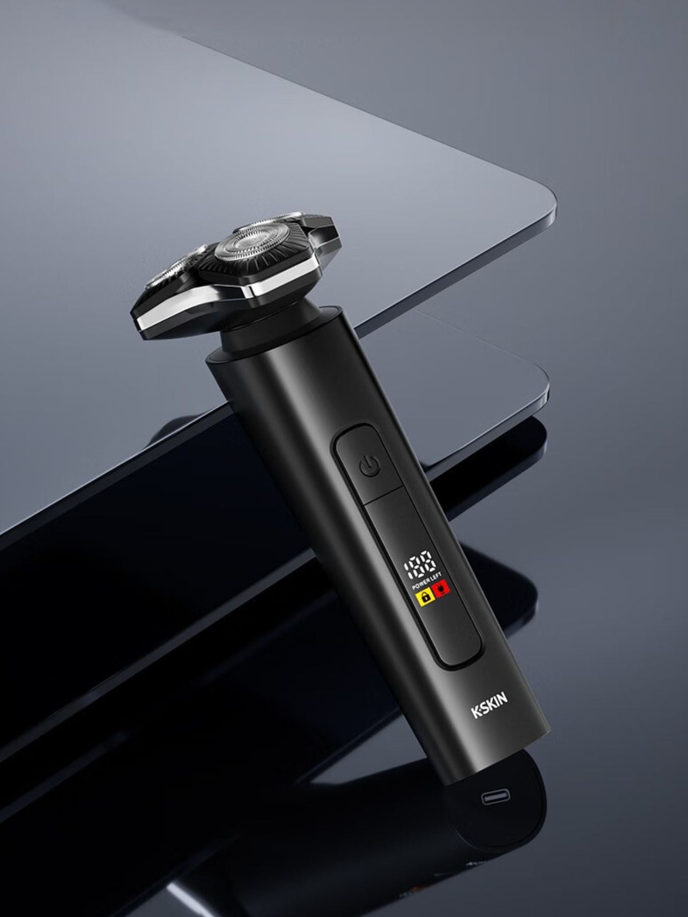 Black 3D rotary electric shaver with LED display showing battery level and settings, designed for smooth grooming.