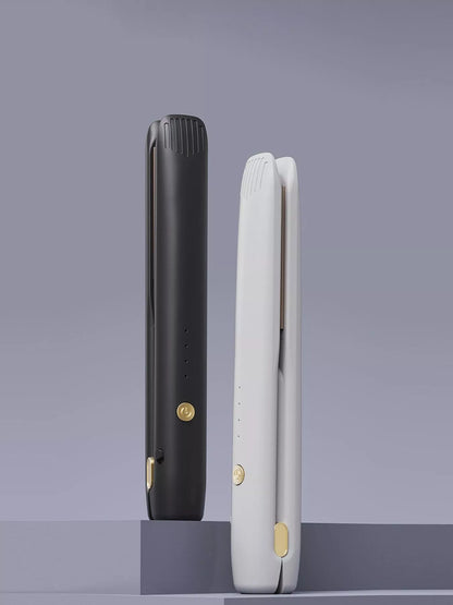 Black adjustable temperature hair straightener from Trendsi with a sleek design and ergonomic handle.