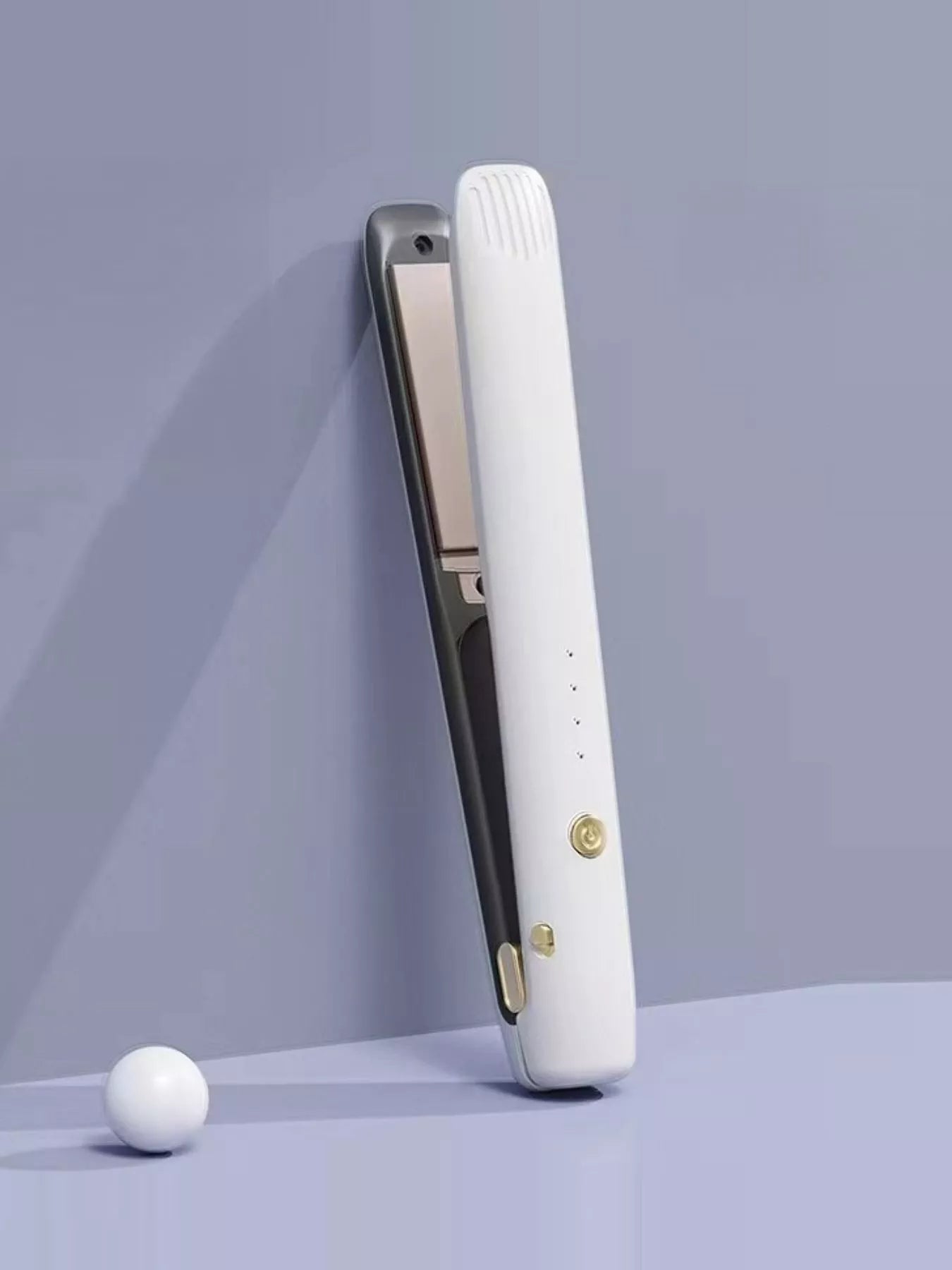 Black adjustable temperature straightener by Trendsi, featuring a sleek design for versatile hair styling.