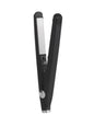 Black ceramic hair straightener from Trendsi, with a sleek design and ceramic plates for smooth, straight hair styling.