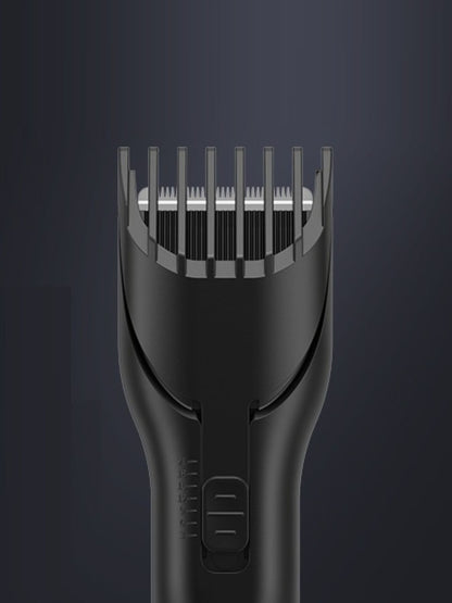 Black cordless hair clipper by Trendsi with a sleek design, perfect for easy at-home or professional hair cutting.