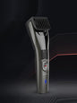 Black Trendsi cordless hair clipper with adjustable blades and ergonomic design for easy grooming.