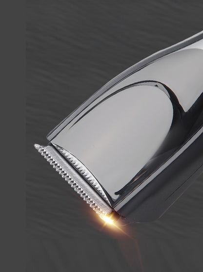 Black cordless hair clipper by Trendsi with a sleek design, perfect for easy, cordless hair trimming at home or salon.