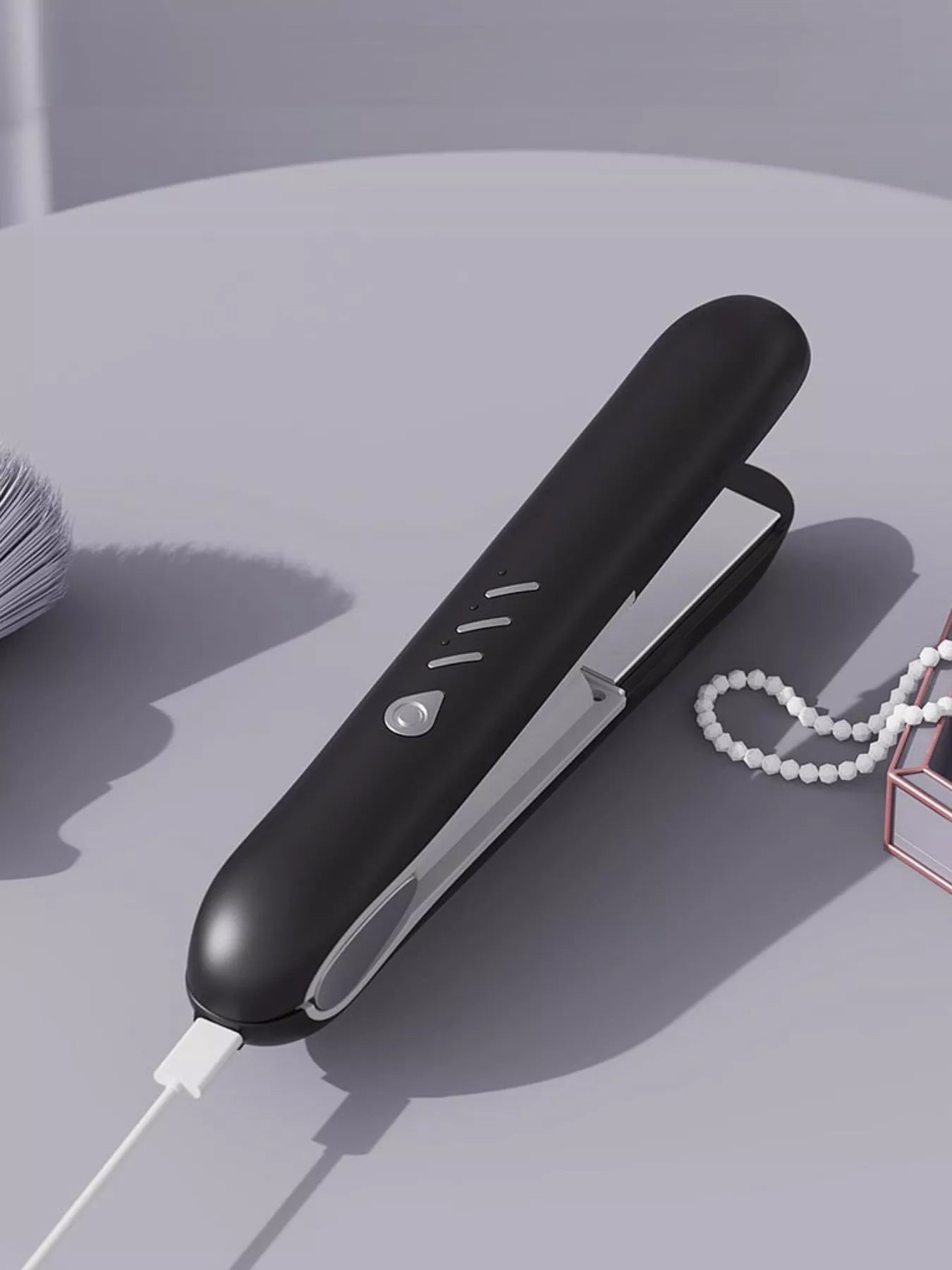 Trendsi cordless rechargeable hair straightener in black with a sleek design, ready for styling on the go.