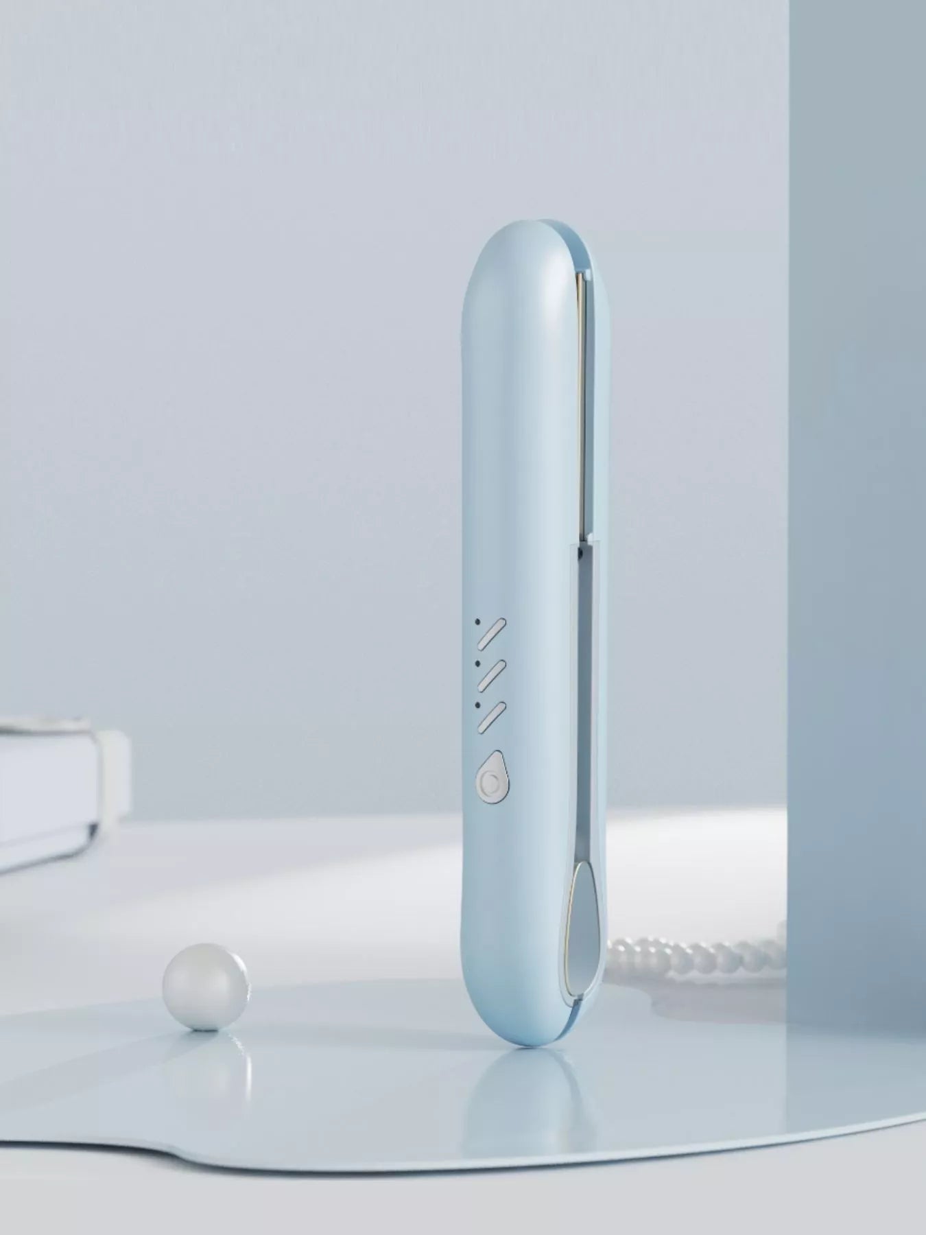 Black cordless rechargeable hair straightener by Trendsi, compact and sleek with ceramic plates for smooth styling.