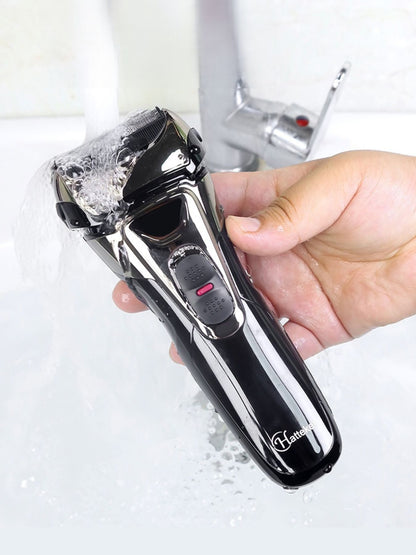 Black electric foil shaver with LED display by Trendsi, showing the shaver's sleek design and LED screen on the front.