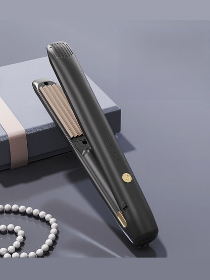 Black Trendsi fast heating hair straightener with sleek design and ceramic plates for smooth, shiny hair.