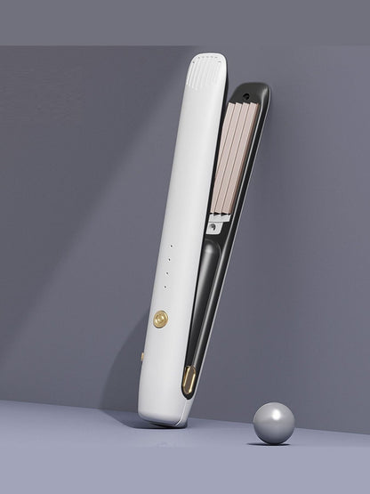 Black Trendsi fast heating hair straightener with sleek design and ceramic plates for smooth, shiny hair styling.