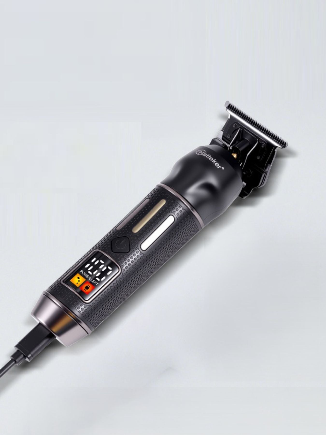 Black cordless hair clipper with LED display from Trendsi, showing adjustable blades and ergonomic design.