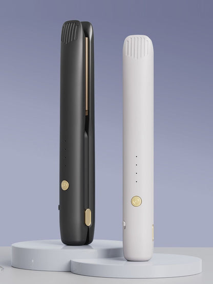 Black portable cordless hair straightener by Trendsi, compact and lightweight for easy styling on the go.