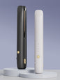 Black portable cordless hair straightener by Trendsi, compact and lightweight for easy styling on the go.