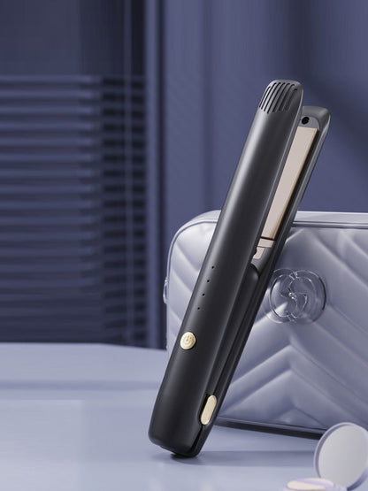 Black portable cordless hair straightener by Trendsi, compact design for easy styling on the go.