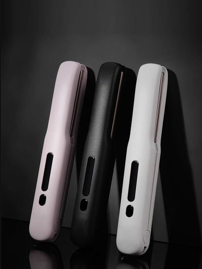 Black portable cordless hair straightener by Trendsi, compact design with ceramic plates for quick styling on the go.