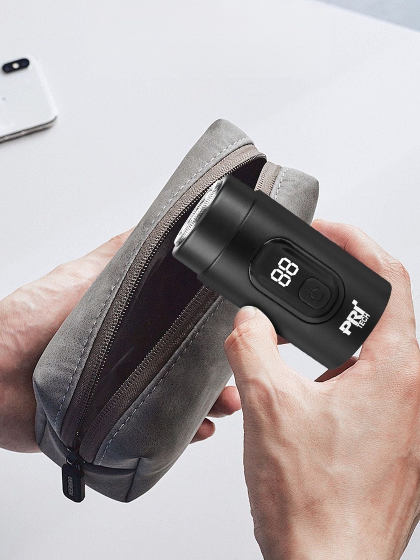 Black portable electric shaver with LED display, compact design, and rechargeable battery from Trendsi.