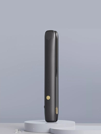 Black portable hair straightener from Trendsi, compact design with ceramic plates for easy styling on the go.