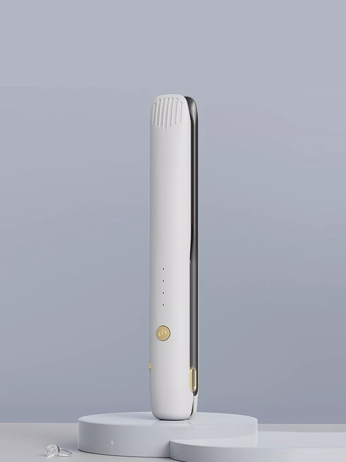 Black portable hair straightener from Trendsi with a sleek design, ideal for quick styling on the go.
