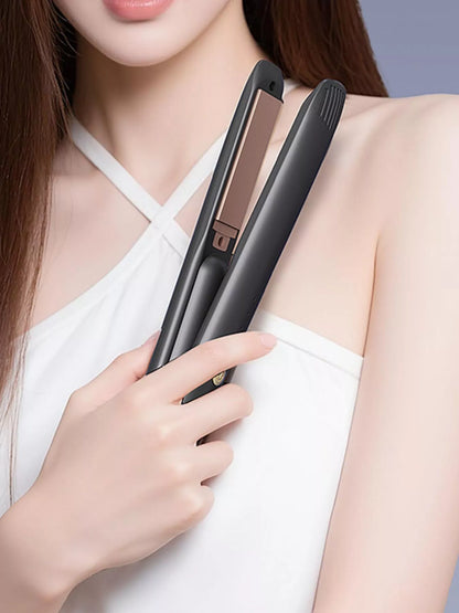 Black portable hair straightener by Trendsi with compact design, perfect for quick styling on the go.