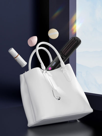 Black portable heated hair straightening comb by Trendsi, showing the compact device with heating plates for styling hair.