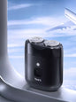 Black portable mini electric shaver by Trendsi, compact design with a sleek handle for easy grooming and travel convenience.