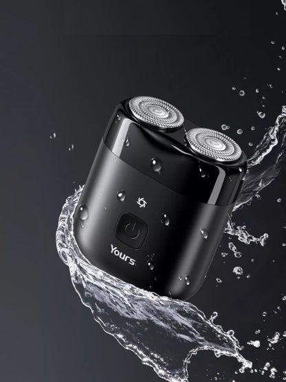 Black portable mini electric shaver by Trendsi, compact design with a sleek handle and foil head for easy grooming on the go.