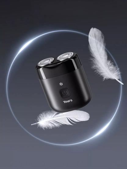 Black portable mini electric shaver by Trendsi, compact design with a sleek look, ideal for quick grooming on the go.