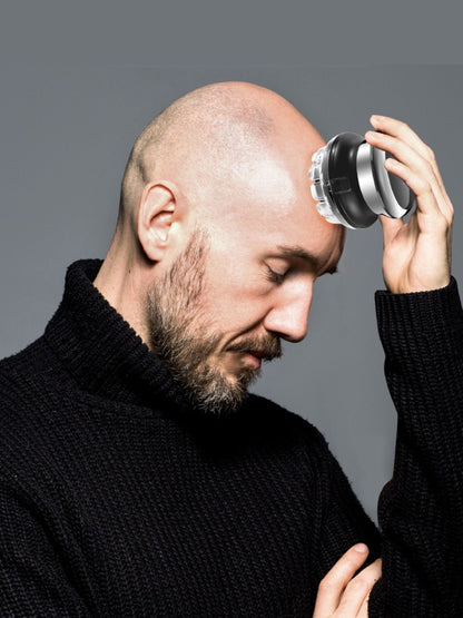 Black rechargeable bald head hair clipper from Trendsi with a sleek design, suitable for precise head shaving.