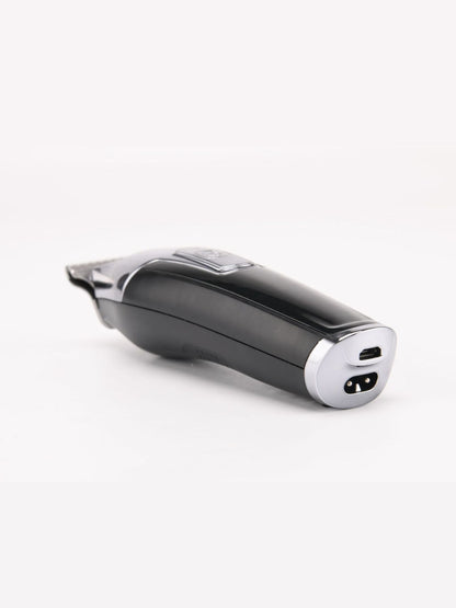Black rechargeable cordless hair clipper by Trendsi with adjustable blades, compact design, and ergonomic grip for easy hair trimming.