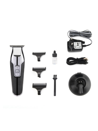 Black cordless rechargeable hair clipper from Trendsi with a sleek design and ergonomic handle for easy hair cutting.