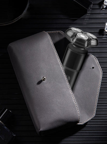 Black rechargeable rotary shaver from Trendsi with a sleek design, suitable for close and comfortable shaving.
