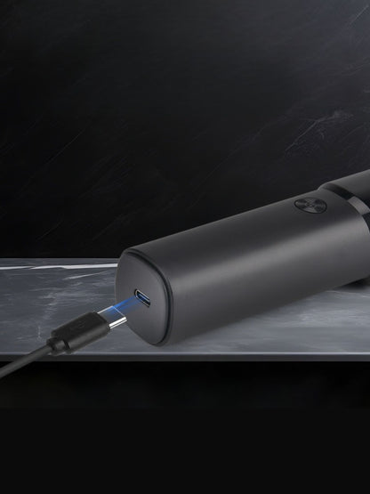 Black Trendsi rechargeable rotary shaver with multiple rotary blades and ergonomic handle for a close, comfortable shave.