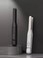 Black Trendsi temperature control hair straightener with ergonomic design and adjustable heat settings for smooth styling.