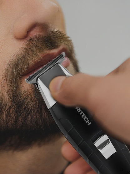 Black waterproof cordless hair clipper from Trendsi with ergonomic design and adjustable blades for versatile styling.