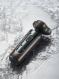 Black waterproof rotary electric shaver by Trendsi, showing close-up of the shaver head and waterproof design features.