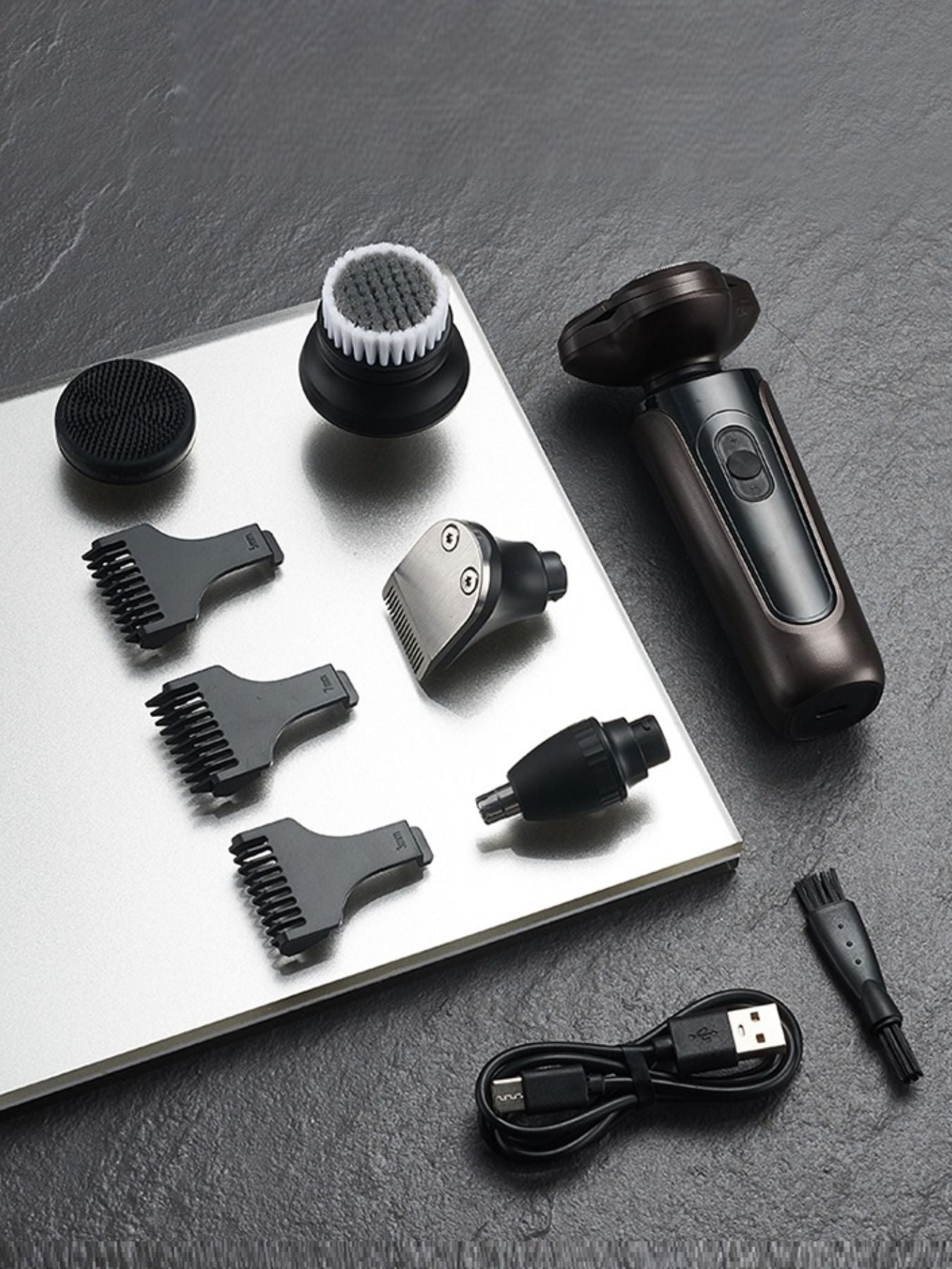 Black waterproof rotary electric shaver from Trendsi with a sleek design and multiple rotary blades for a close shave.
