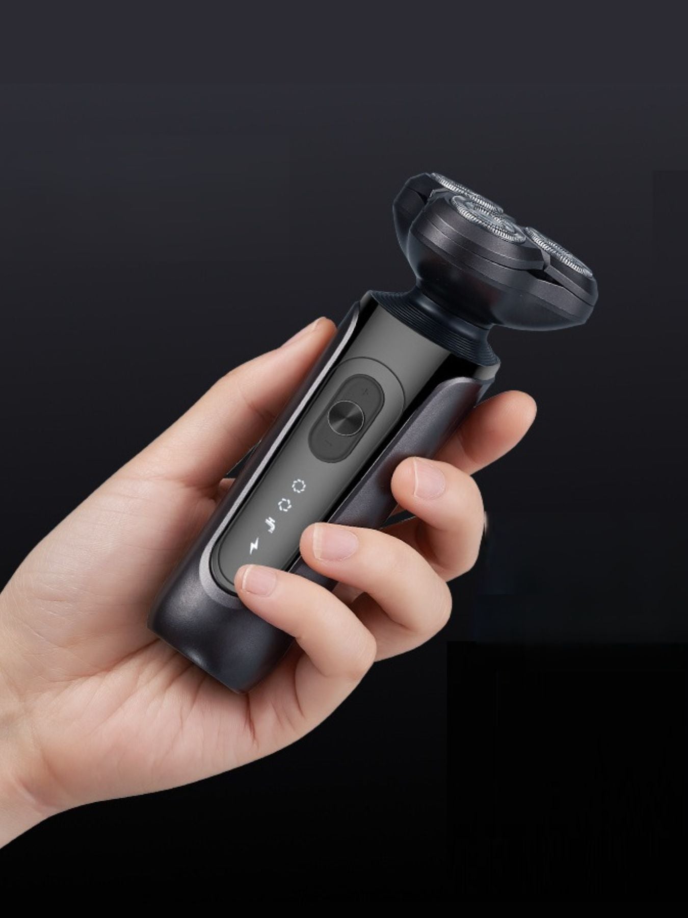 Black waterproof rotary electric shaver by Trendsi with a sleek design, suitable for wet and dry use, close-up view.