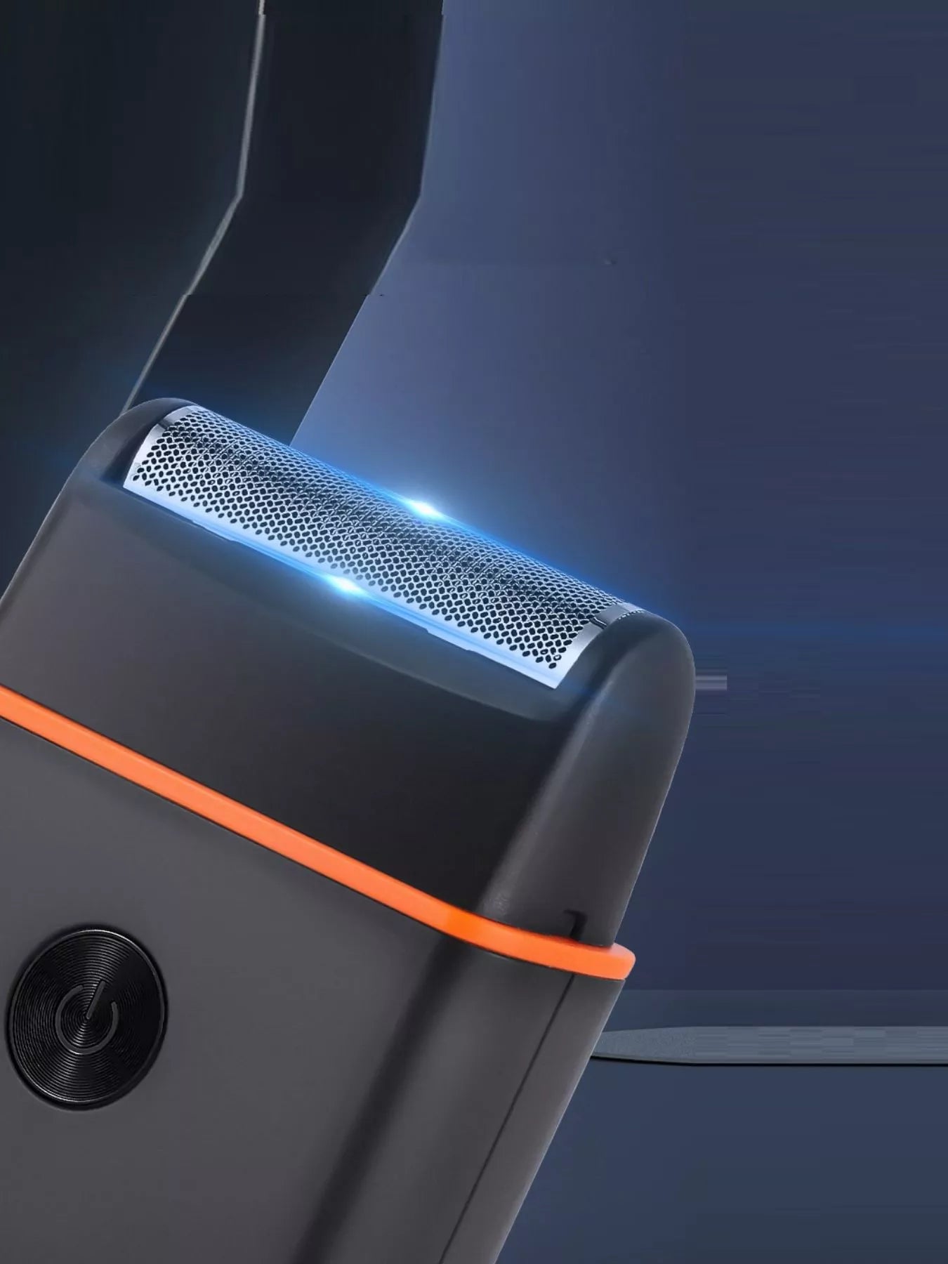 Black and orange Trendsi portable mini shaver with a compact design, ideal for on-the-go grooming.