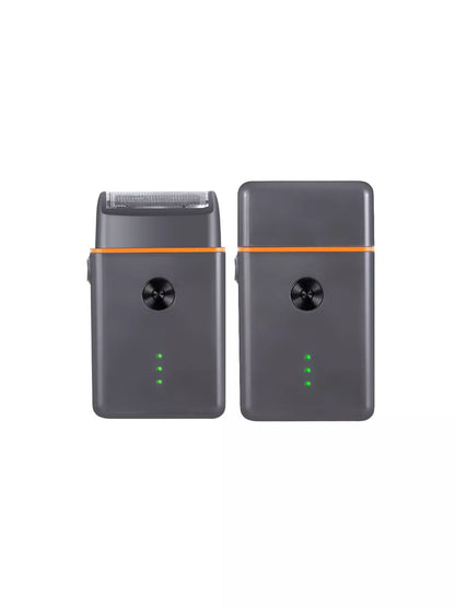 Black and orange portable mini shaver by Trendsi, compact design with a sleek edge for quick grooming on the go.